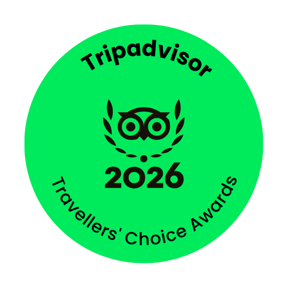 A green TripAdvisor Travelers' Choice Awards 2026 badge with the TripAdvisor logo centered. logo on footer section.